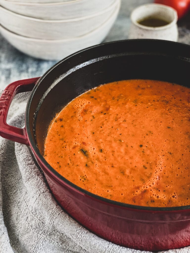 roasted tomato basil soup in dutch oven waiting to be served