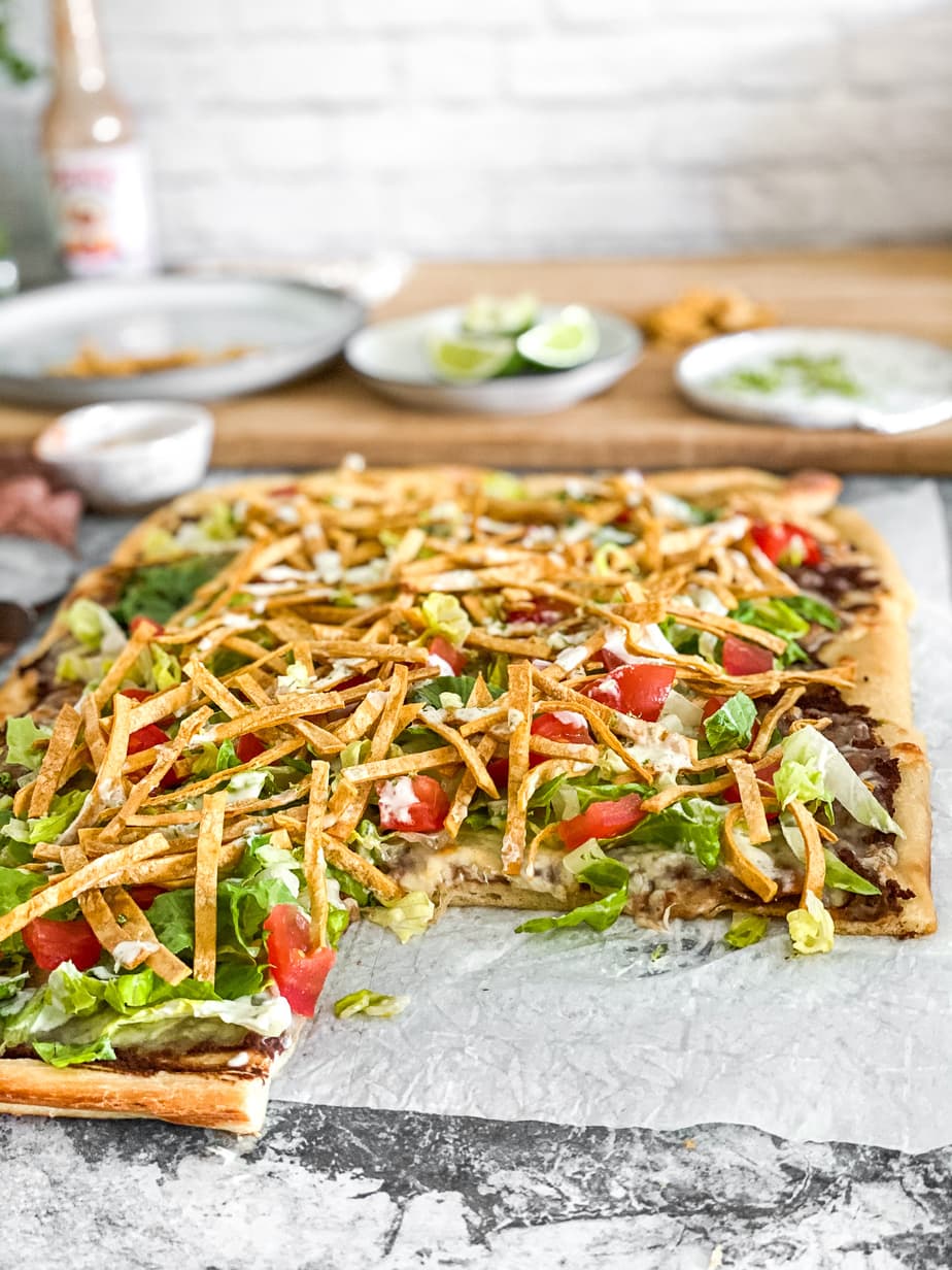 taco pizza side shot with slice missing